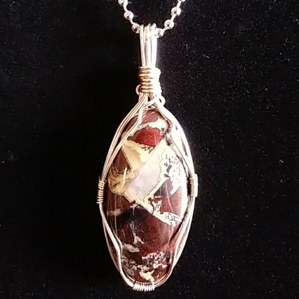 Rainbow Jasper necklace with quartz pocket